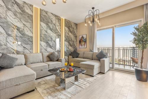 Ein Sitzbereich in der Unterkunft Desert Key - Perfectly Located Yas Island Premier Apts