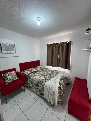 Ένα ή περισσότερα κρεβάτια σε δωμάτιο στο Apartamento Mobiliado para seu conforto