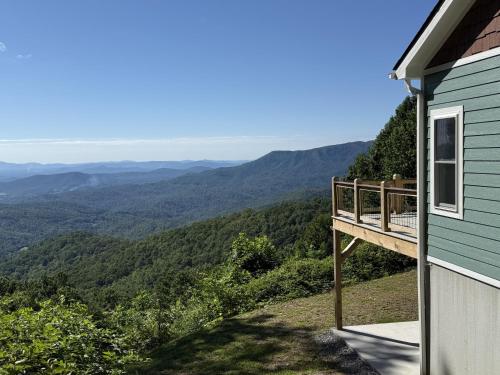 a balcony of a house with a view of the mountains at Solomon’s Seal - Full Home in Spruce Pine