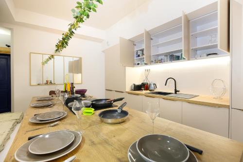Η κουζίνα ή μικρή κουζίνα στο Confort & espace avec climatisation - T4 central