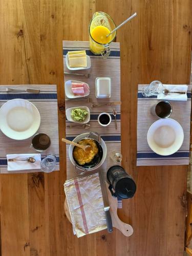 an overhead view of a table with plates of food at Casa Luna in San Pedro de Atacama