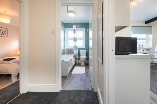 Ένα ή περισσότερα κρεβάτια σε δωμάτιο στο Perfect Flat In Hexham Town Centre
