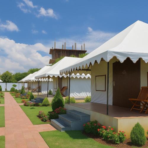 a building with a white tent with some plants and flowers at Siya Resort Ayodhya - Comfortable Rooms & Luxury Stay Near Ram Mandir in Ayodhya