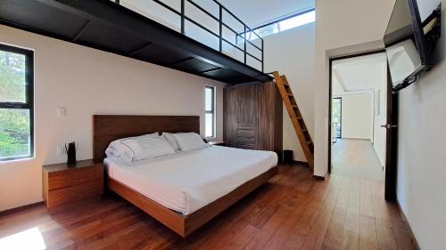 Katil atau katil-katil dalam bilik di Casa con jacuzzi