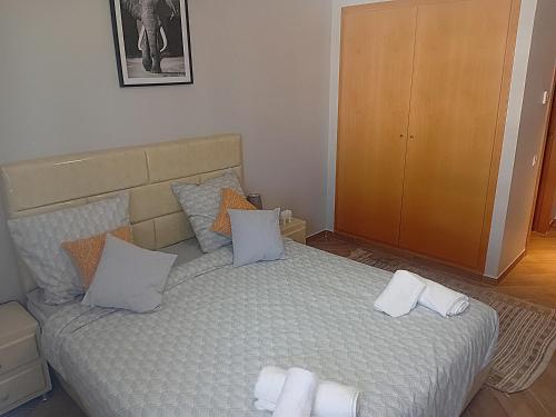 Postel nebo postele na pokoji v ubytování AgadirBay IkenParc centre piscine , et plage à 5mnts à pieds