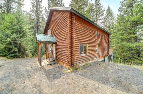 a small log cabin in the middle of the woods at Cascade Log Cabin by Casago McCall - Donerightmanagement in Cascade