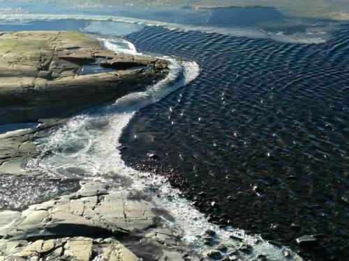 an aerial view of a rocky shore with water at 5 star holiday home in VÄSTERVIK-By Traum in Västervik