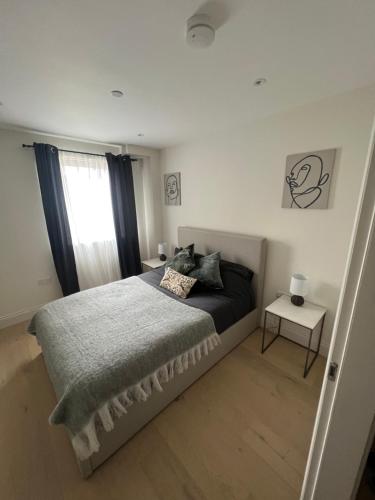 Ένα ή περισσότερα κρεβάτια σε δωμάτιο στο Relaxing and modern apartment