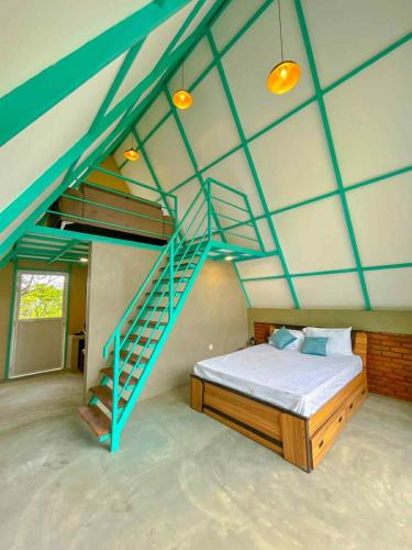 a bedroom with a bunk bed and a staircase at Shenaya Plantation 