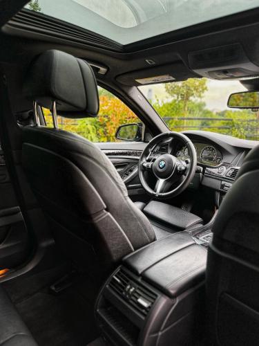 a view of the dashboard of a car at BMW 535i in Tbilisi City