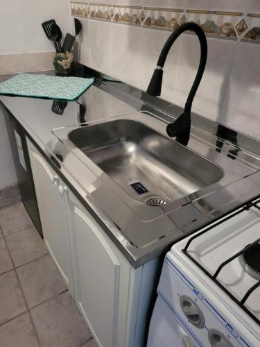 Kuchyň nebo kuchyňský kout v ubytování Alma Depto