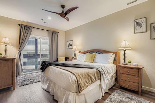 a bedroom with a large bed and a window at Peaceful Lift Line Condo 207 in Park City