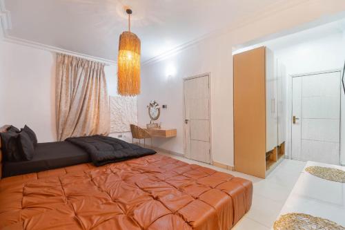Ένα ή περισσότερα κρεβάτια σε δωμάτιο στο Tastefully Furnished Two Bedrooms Lekki Ikate