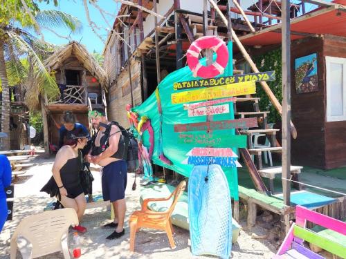 a group of people standing in front of a bus at Atalaya Buceo Cari Blue in Playa Blanca