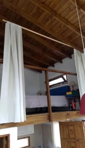 Palanda nebo palandy na pokoji v ubytování Cabaña Mar Azul