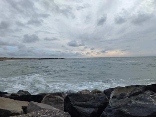 a view of the ocean from a rocky beach at 5 star holiday home in Vestervig-By Traum in Vestervig