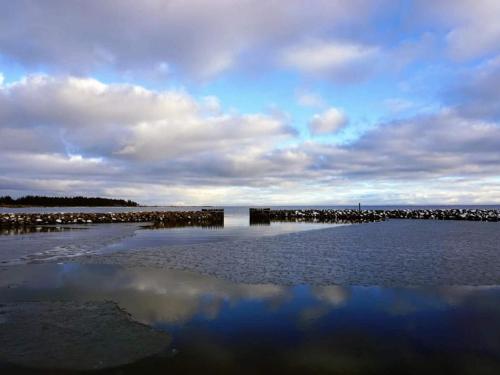 a large body of water with a cloudy sky at 5 person holiday home in Vesløs-By Traum in Øsløs