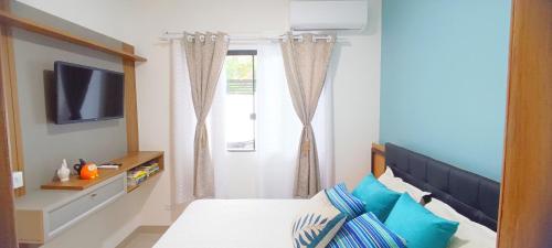 Postel nebo postele na pokoji v ubytování Jk Beach House Praia de Leste- Piscina e Ar condicionado