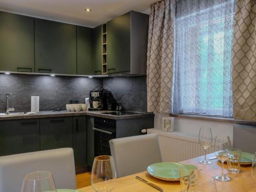 Kuchyň nebo kuchyňský kout v ubytování Chalet Gandler