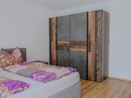 Postel nebo postele na pokoji v ubytování Chalet Gandler