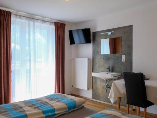 Postel nebo postele na pokoji v ubytování Chalet Gandler