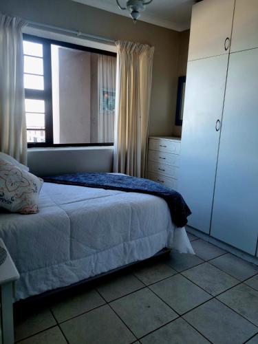 Postel nebo postele na pokoji v ubytování Tilde's Self-Catering
