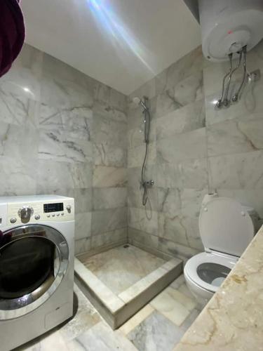 Ένα μπάνιο στο Appartement vue à la mer Bouznika