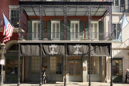 a man walking in front of a building at Roami at St. Helene in New Orleans