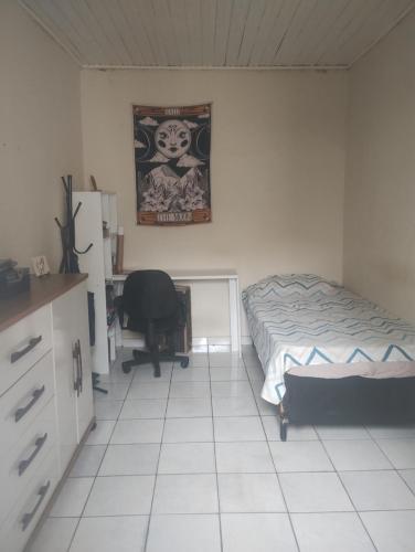 Postel nebo postele na pokoji v ubytování Quarto