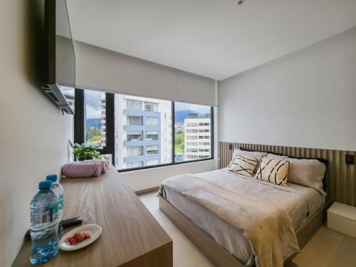Postel nebo postele na pokoji v ubytování Studio en la mejor zona de Quito La Carolina