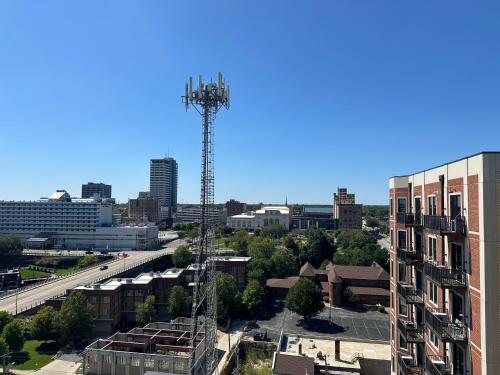 a view of a city with a cell phone tower at Luxury High Rise Downtown Apartment in South Bend