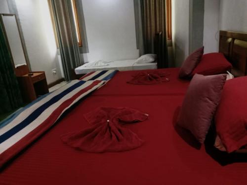 Una cama o camas en una habitación de Thehideout kurunegala