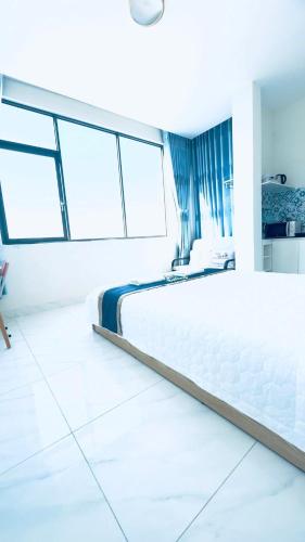 Ένα ή περισσότερα κρεβάτια σε δωμάτιο στο Spring Homestay