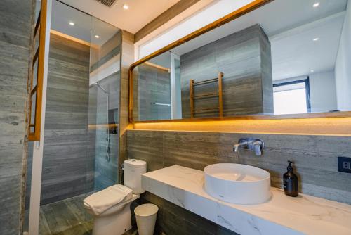 Bilik mandi di LOI Mansion Managed by ARM One Hundred