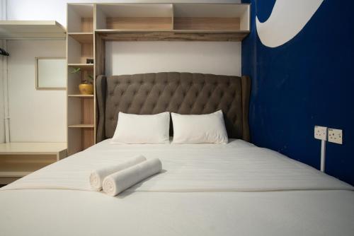 Postel nebo postele na pokoji v ubytování Moustachz Hauze , Georgetown