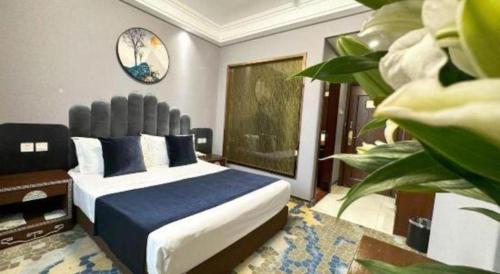 Dunhuang Dunhe Hotelにあるベッド