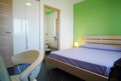 Кровать или кровати в номере Villacristiano