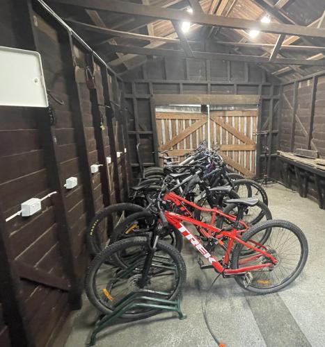 a row of bikes parked in a garage at Montrose on Moore in Linville