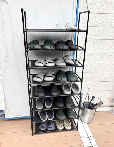 a rack of shoes in front of a door at ISU BASE - Vacation STAY 12851 in Shima