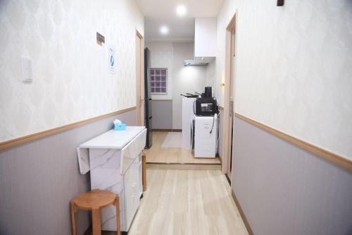 Una cocina o cocineta en 東京桜の宿