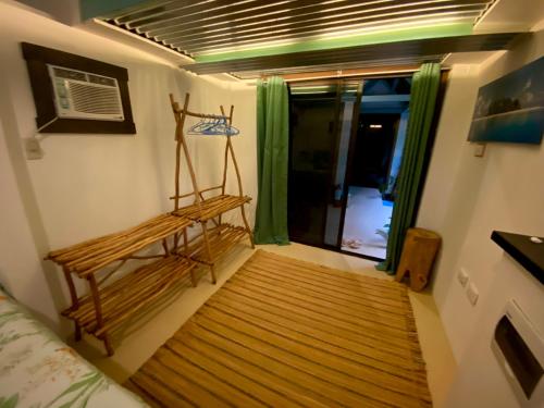 Postel nebo postele na pokoji v ubytování DJs Beach Resort