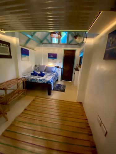 Postel nebo postele na pokoji v ubytování DJs Beach Resort