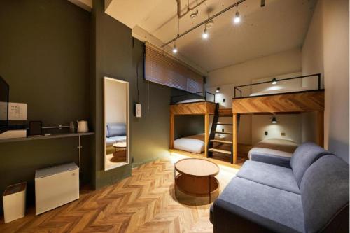 Postel nebo postele na pokoji v ubytování mizuka Daimyo 6 - unmanned hotel -