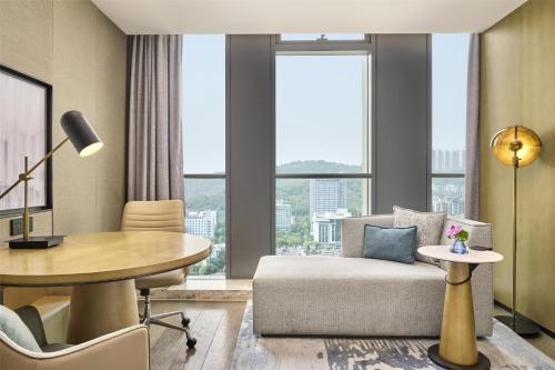 Area soggiorno di Hilton Chongqing Liangjiang New Area