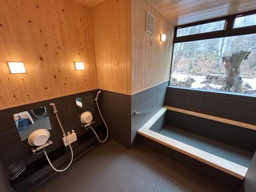 Koupelna v ubytování Lodge Pinokio Backpackers