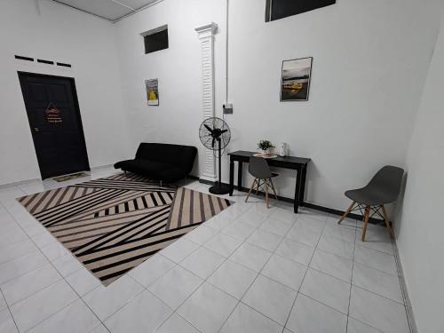 Χώρος καθιστικού στο Rahmah Homestay Temerloh