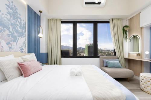Postel nebo postele na pokoji v ubytování Uptown Palms 1BR Suite Fuente, Walk to CebuDoc
