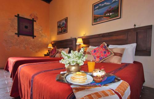 Ένα ή περισσότερα κρεβάτια σε δωμάτιο στο Hotel Convento Santa Catalina by AHS