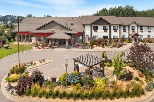 an aerial view of a building with a garden at Super 8 by Wyndham Eveleth in Eveleth