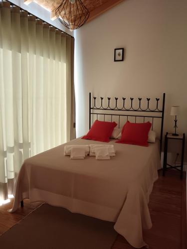 Katil atau katil-katil dalam bilik di Quinta do Fortunato-Casa dos Caseiros-Minho, Viana do Castelo, Meixedo-Turismo rural